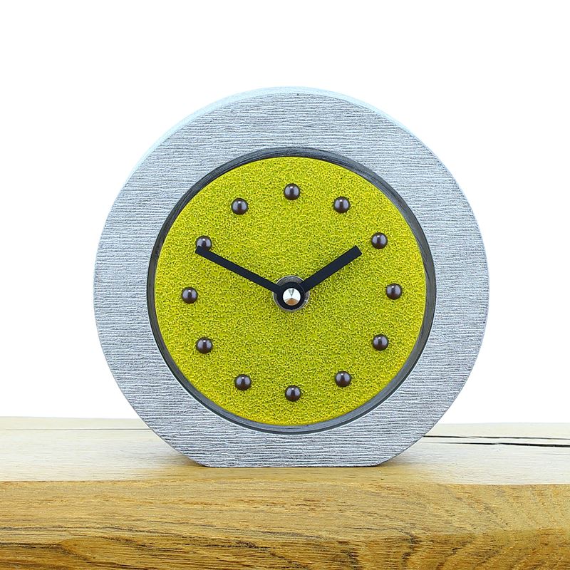 Round Yellow Mantel Clock, Silver Frame, Antique Studs, Black Hands